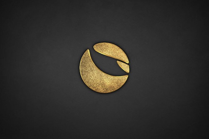 A golden textured version of the Terra Classic (LUNC) logo is displayed against a dark background, symbolizing the cryptocurrency's enduring value amid market speculation. The image visually represents the brand referenced in the discussion about LUNC and USTC's market challenges.