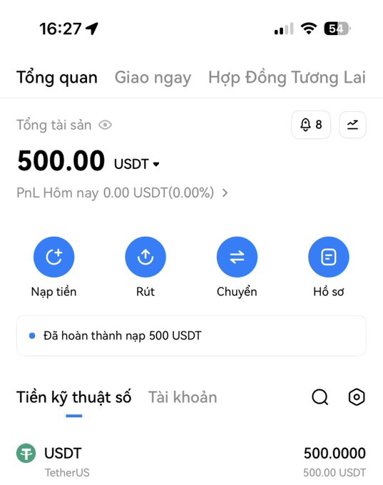 A Vietnamese cryptocurrency exchange app interface displaying a total asset balance of 500.00 USDT, with options to deposit (Nạp tiền), withdraw (Rút), transfer (Chuyển), and statement (Hồ sơ), showing a completed deposit of 500 USDT.