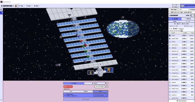A space-themed blockchain game showing a station builder interface with a satellite/solar array structure, featuring various menu panels and a 'START GAME' button.