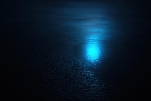 iced water droplets on a dark surface, creating a mirror-like reflection of the surrounding environment.