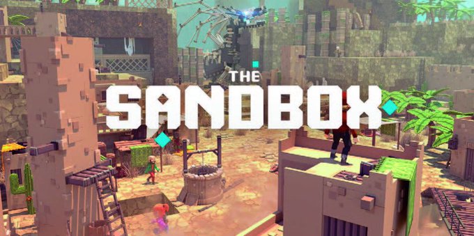 The image shows promotional artwork for "THE SANDBOX" featuring voxel-style characters and a desert village setting with the game's logo prominently displayed. This branding image accompanies a post warning about an alleged active exploit on The Sandbox's LayerZero bridge on Base, claiming unauthorized minting of billions of $SAND tokens.