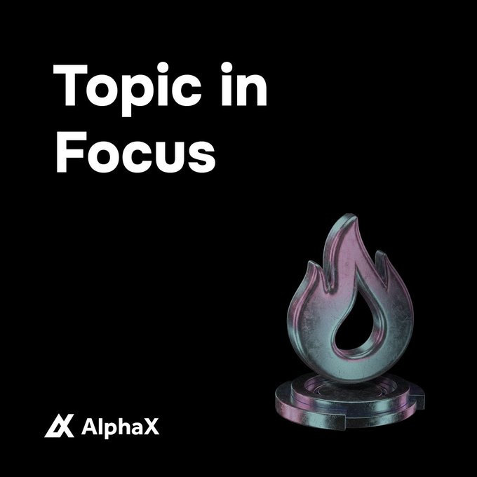 A promotional graphic with 'Topic in Focus' text and the AlphaX logo, featuring a stylized flame trophy or emblem on a circular base against a black background.