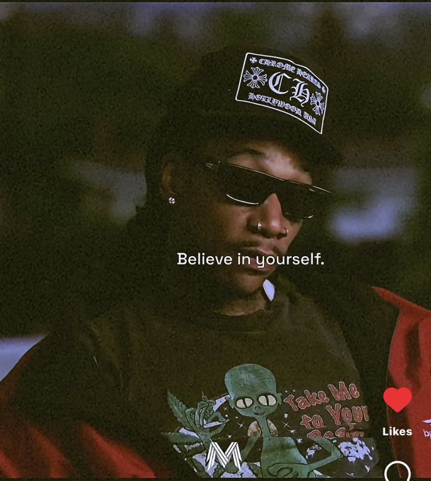 A stylized photo of a man wearing a black Chrome Hearts beanie, a graphic sweater, and dark sunglasses, with the motivational text 'Believe in yourself.' overlaid.