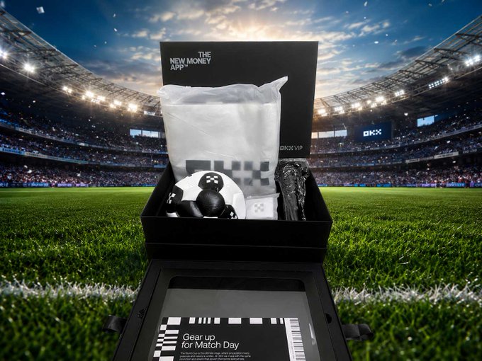 A promotional image shows a 'THE NEW MONEY APP' matchday gift box containing merchandise and a soccer ball, displayed on a stadium field with the text 'Gear up for Match Day'.