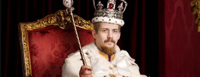A bearded man wearing a jeweled crown and royal robes sits on an ornate red and gold throne while holding a scepter, portrayed in a regal portrait style. The image satirically represents "King Dash" as a self-proclaimed sovereign of the Dash cryptocurrency, visually reinforcing the post's jest about his infallible claims regarding the blockchain's security.