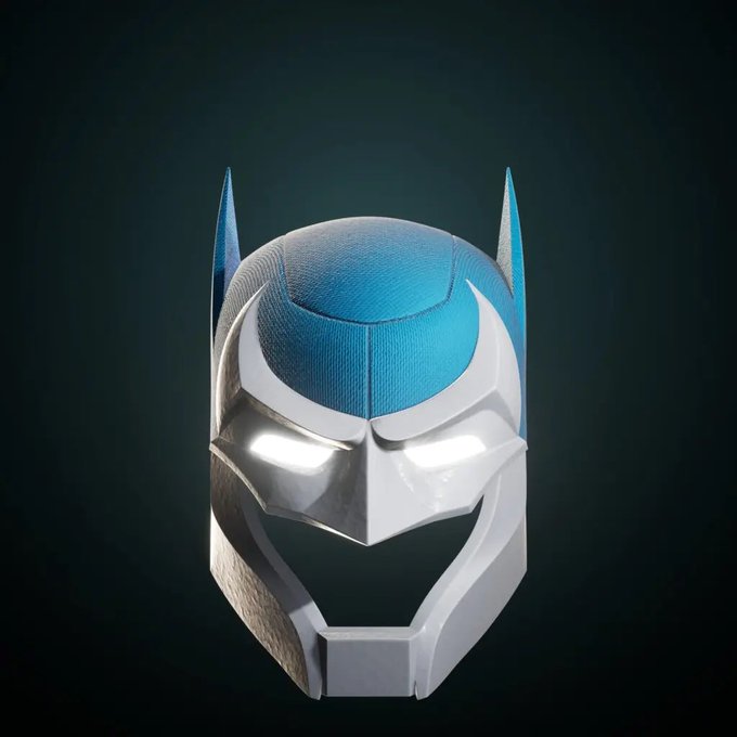 A 3D render of a futuristic helmet/cowl design in blue, white, and silver tones with glowing white eyes, displayed against a dark background.