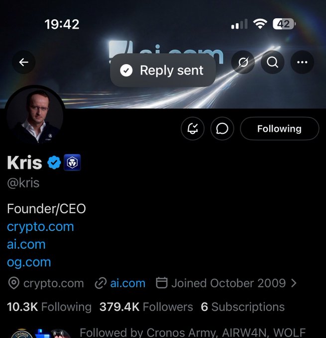 A Twitter/X profile screenshot for Kris (@kris), Founder/CEO of Crypto.com, showing "Reply sent" notification at the top. The post relates to Kris being asked whether his removal of $CRO from his profile signals a full takeover by "Ryan" of the Cronos DeFi ecosystem, given his listed company domains include crypto.com and ai.com.
