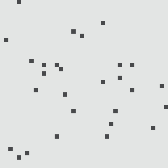 A white background scattered with small black squares in a seemingly random pattern.