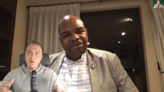 A video call screenshot shows two men, with one wearing a "CalmKlam" hoodie, while another man in a gray blazer smiles in the main frame, appearing to express gratitude in response to a conversation.