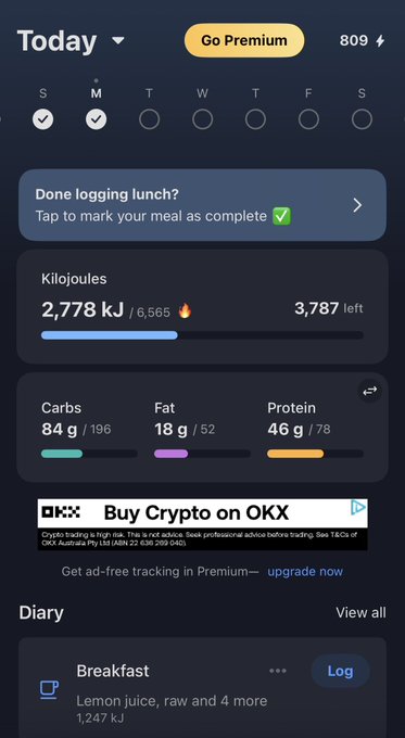 The image shows a phone screen displaying various information, including a list of food items with their calorie counts and nutritional values. The app also provides an option for purchasing cryptocurrency from a specific website. The text "Crypto and calories They're stalking me @okx @OKXAustralia" is present in the image, which seems to be related to the post about Cryptocurrency.