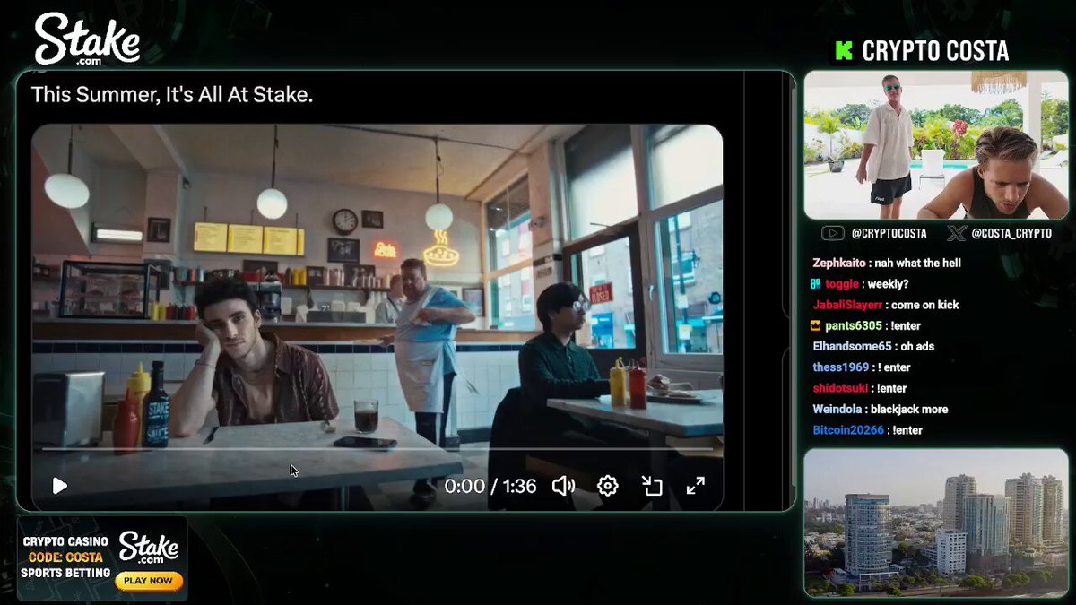 This screenshot shows a video or streaming platform with a video of people playing a game. It appears that a person has just dropped an advertisement for the World Cup, as indicated by the specific text "Stake Just Dropped Their World Cup Ad Sign up using code: COSTA #stake #KICK #Worldcup". The image also features a man sitting at a dining table with two other men and chairs around him.