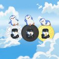The image features three cartoon penguins sitting on top of different colored circles against a blue sky with clouds. The penguin on the left is white, the one in the middle is black, and the one on the right is yellow. Each penguin has a hat on their head, adding to the playful atmosphere of the scene.