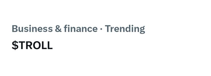 The image features a gray background with white text that reads "Business & finance - Trending $TROLL". This phrase is written in all capital letters, making it stand out against the gray background. The text is positioned at the top of the image, drawing attention to its message and creating a sense of importance or urgency related to the topic of business and finance.