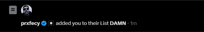 The image is a notification from Twitter/X showing that user **prxfecy** (with a blue verified checkmark) added the user to a list titled "**DAMN**" one minute ago. The playful notification ties into the caption's caption about being flattered by being added to such a bold list name.