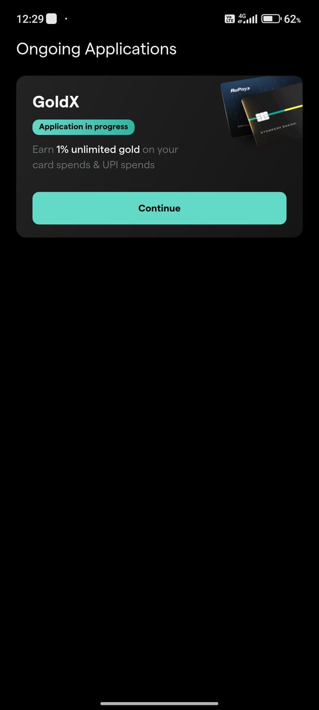 The image shows a cell phone screen with an app called "Goldx" displayed, along with a credit card application for Goldx. The text on the screen indicates that the user needs to enter their Apple ID and password to proceed with the application process.