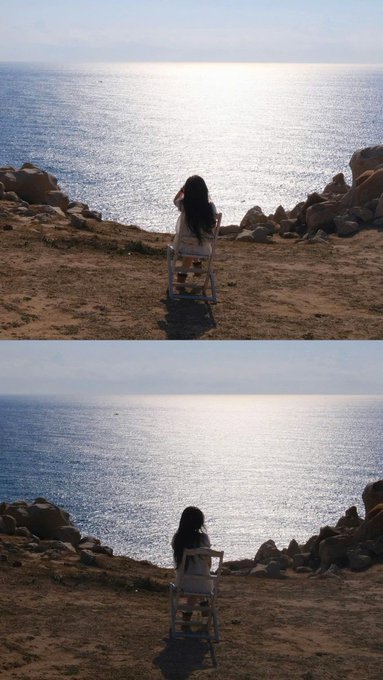 A person with long dark hair sits in a folding chair on a rocky coastal cliff, gazing out at a sunlit ocean; the same scene is shown twice stacked vertically.