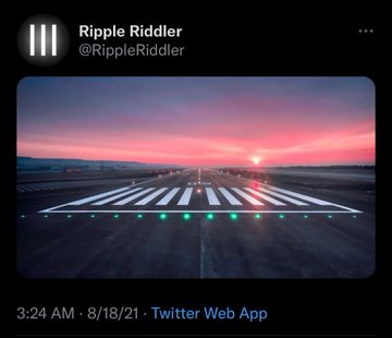 A tweet from Ripple Riddler (@RippleRiddler) posted at 3:24 AM on 8/18/21 via Twitter Web App, featuring a photo of an airport runway at sunset with illuminated green approach lights and a glowing pink and orange sky.