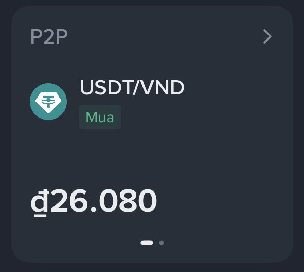 A cryptocurrency trading interface showing a P2P exchange for USDT/VND with the label 'Mua' (Buy) and a price of '₫26.080' displayed in Vietnamese Dong.