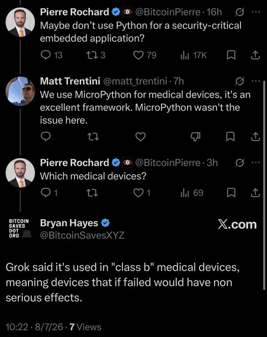 Twitter/X conversation between Pierre Rochard (@BitcoinPierre) and Matt Trentini (@matt_trentini) debating the use of Python for security-critical embedded applications, with MicroPython used in medical devices. A quoted reply from Bryan Hayes (@BitcoinSavesXYZ) clarifies that Grok stated MicroPython is used in "class b" medical devices with non-serious failure effects.