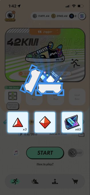 A screenshot of a mobile fitness game interface showing a 'Jogger' achievement for 42km, a highlighted reward chest, and inventory items including a red triangle (x3), orange diamond, and blue crystal (x65).