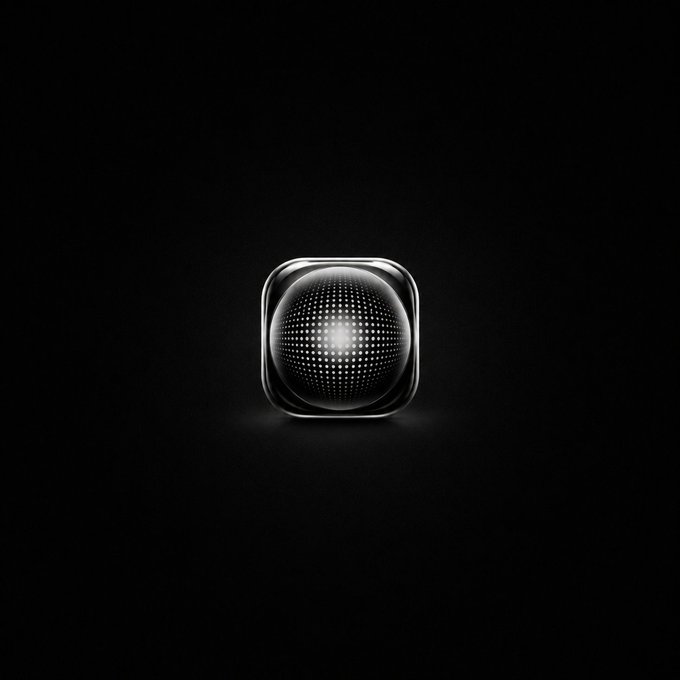 A glowing glass cube with a radiant sphere of light at its center floats against a dark background, symbolizing a "good morning" greeting of illumination and positivity for UXUY app users. The ethereal orb represents the bright start to the day being wished upon the community.