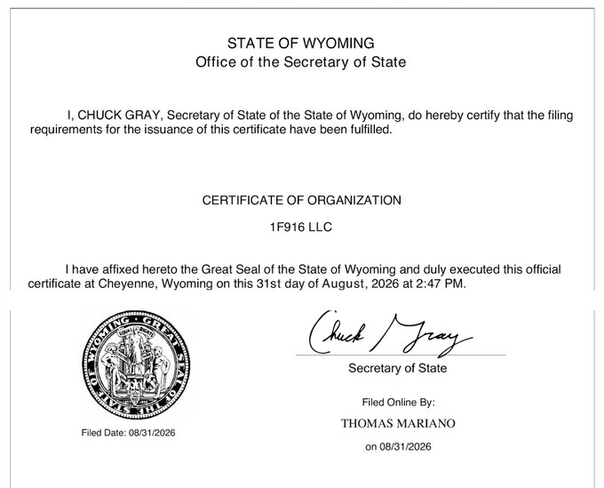 A Wyoming Certificate of Organization for "1F916 LLC" filed on 08/31/2026, signed by Secretary of State Chuck Gray. The image humorously illustrates "Step 2" by showing the official state paperwork required to spawn one new autonomous economic entity—suggesting scaling this process a billion times to build machine civilization's infrastructure.