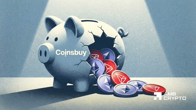 A cracked piggy bank with 'Coinsbuy' text spilling out cryptocurrency coins, branded with 'AMB CRYPTO' logo.