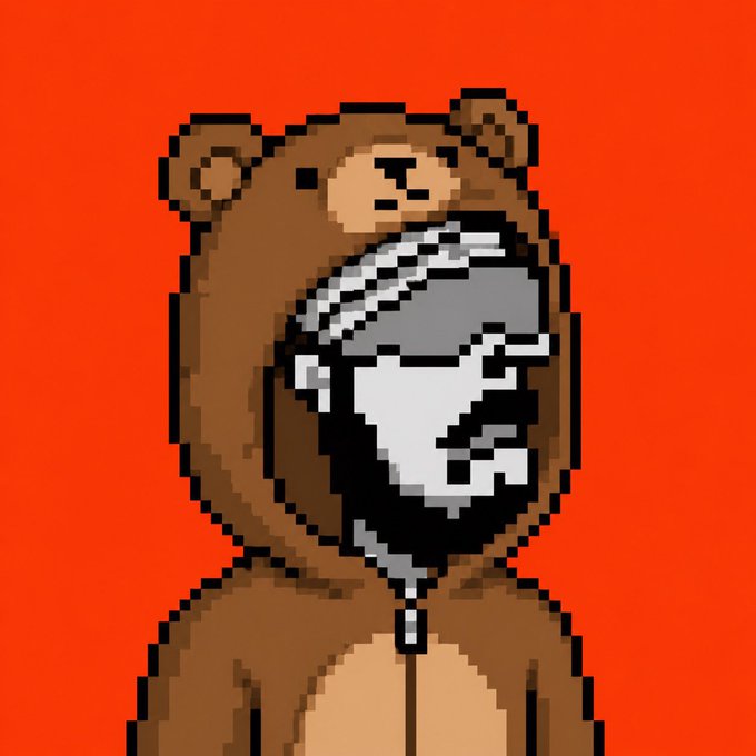 The image features a man wearing a brown bear costume with a hood and goggles, standing against a red background. The caption below the image reads "In 2020 you could have got 𝐴𝑡𝑖𝑛𝑟𝑠 at 𝐵𝑒𝑜𝑚𝑎𝑙" which is related to the post about cryptocurrency.