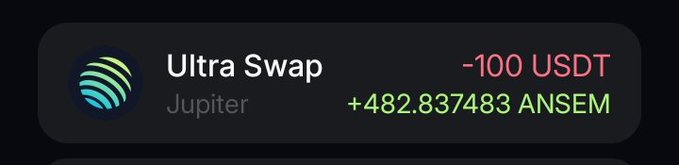A transaction notification shows an "Ultra Swap" via Jupiter, exchanging -100 USDT for +482.837483 ANSEM. The image corresponds to the post's claim of buying more $ANSEM, visually confirming the token purchase.