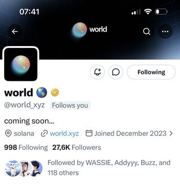 The image shows the Twitter/X profile of "world 🌐" (@world_xyz), a Solana project with 27,600 followers and a "coming soon..." tagline, joined in December 2023. The accompanying post appears to be a humorous reply poking fun at the project's rapid visibility on timelines while playfully suggesting it has a "giant intern" reference (potentially alluding to the "998 Following" count being notably high for a project account).