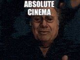 The image features a man with glasses wearing a black shirt, sitting against a dark background. He appears to be smiling at the camera. The caption below the photo reads "Absolute Cinema", which seems to be a reference to the movie Absolute Value. Additionally, there is text that says "ZEC vulnerability on the same day as Quantinuum IPO? wow that'S crazy". This could possibly be an advertisement or promotional material for the movie Absolute Value, with the ZEC vulnerability being related to its release date.