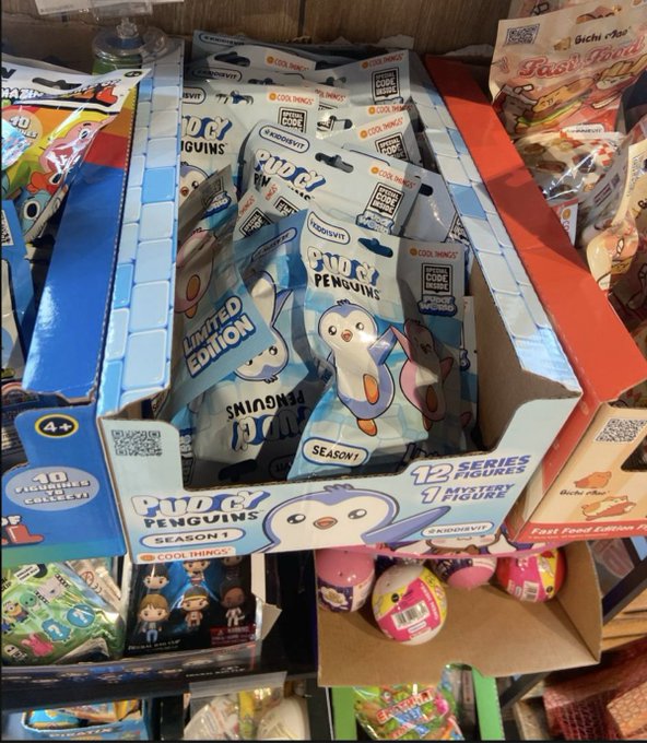 A retail display box of 'Pudgy Penguins' Season 1 collectible toys, featuring 40 figurines to collect and 12 series with 1 mystery figure, marked as a 'Limited Edition'.