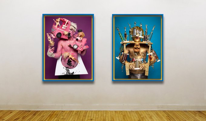 A gallery view showing two framed artworks: the left depicts a pink figure carrying toy cars and objects, and the right features a golden figure surrounded by drums.