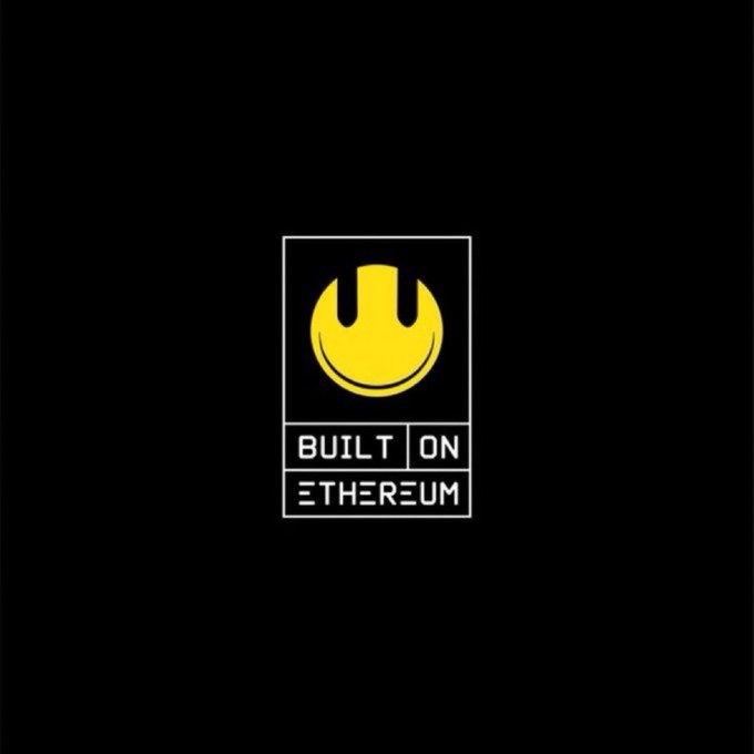 A yellow smiley face logo sits above a rectangular badge reading "BUILT ON ETHEREUM" on a black background, playfully reimagining Ethereum's branding as a celebratory birthday emblem for the "World Computer."