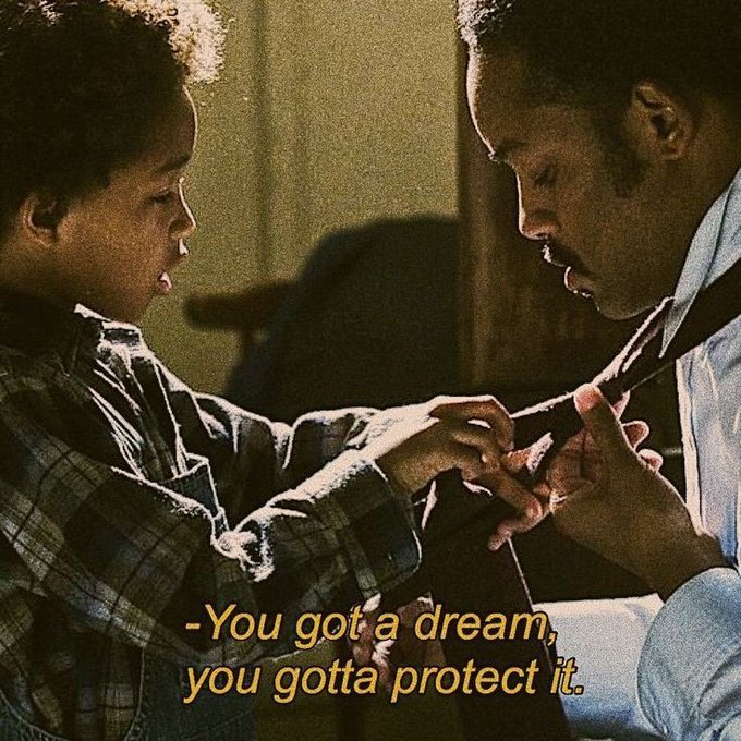 A father steadies his son’s hands as he adjusts a tie, with the caption: “You got a dream, you gotta protect it.” From *The Pursuit of Happyness*, the motivational scene fits the “Gm CT” post’s encouraging good-morning message.