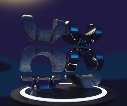 A 3D rendered image shows dark blue metallic and matte shapes arranged on a circular platform with a glowing white ring.