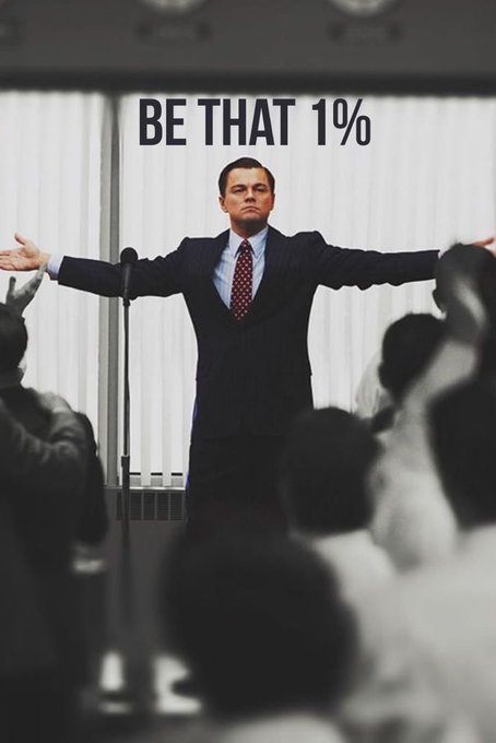 A meme image of Leonardo DiCaprio as Jordan Belfort from 'The Wolf of Wall Street' with arms outstretched to a crowd, overlaid with the text 'BE THAT 1%'.