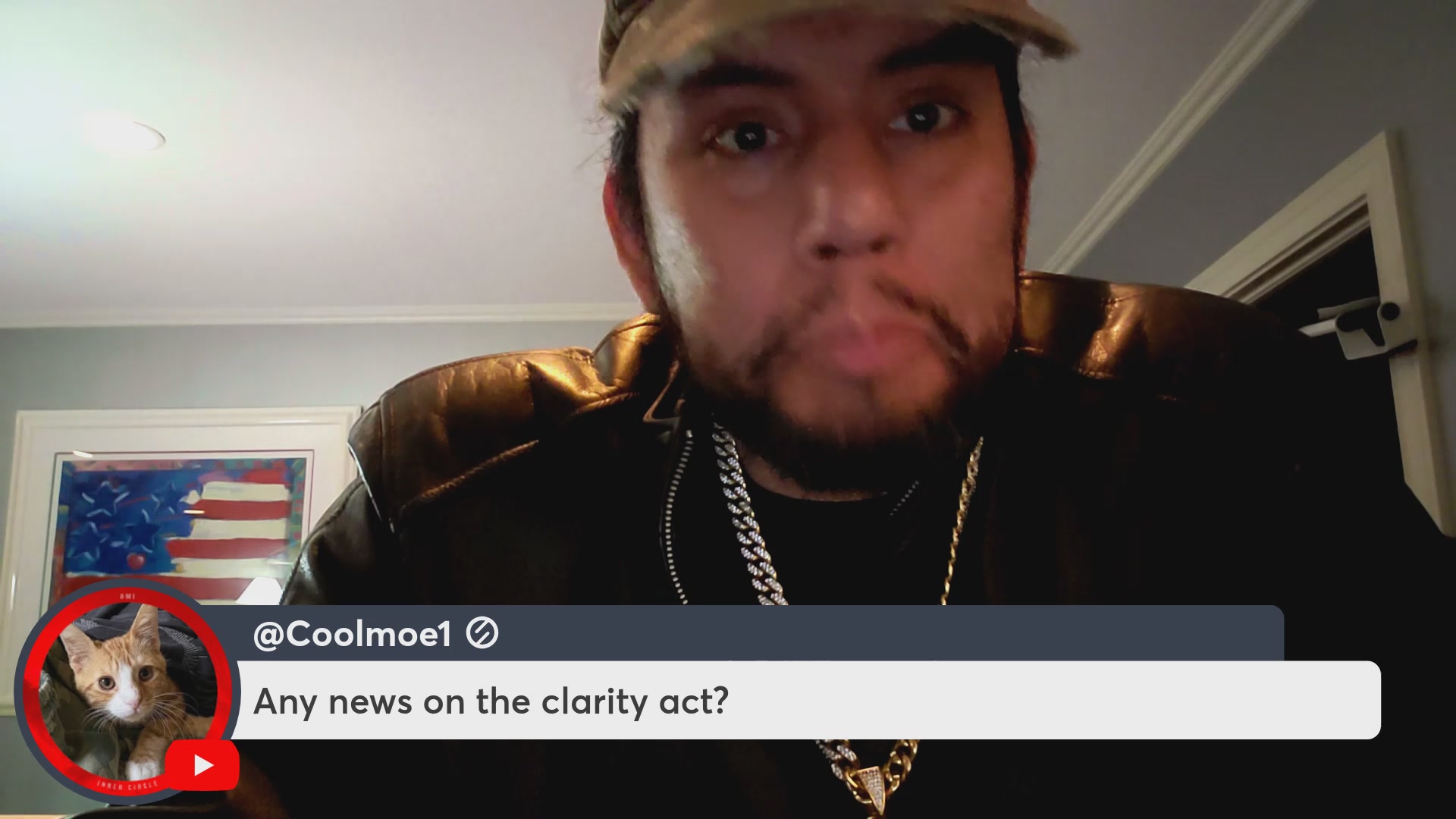 The image features a man wearing a hat, a leather jacket, and a chain necklace with a caption that reads "VeVe affiliate program brings in thousands of new users! $OMI $DEFX $DEVVE Dacat news!". The man is looking directly at the camera while posing for the photo.