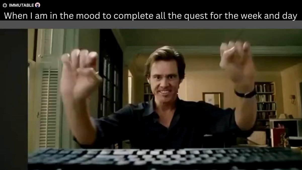 The image features a man sitting at a computer keyboard, with his hands raised above the keys as if he has just completed an important task or won a game. The caption below the photo reads "When I am in the mood to complete all the quests for the week and day", which seems to be a reference to the post about completing tasks on @Immutable.