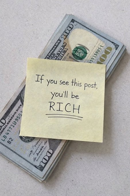 A handwritten yellow sticky note reading 'If you see this post, you'll be RICH' placed on top of a stack of US hundred-dollar bills.