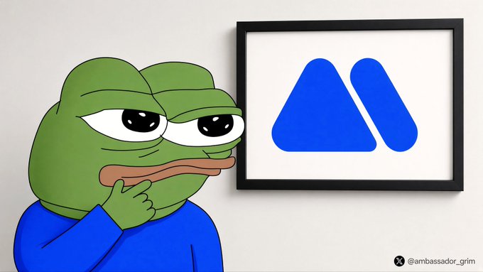 A cartoon Pepe the Frog in a blue shirt looks thoughtfully at a framed blue logo on a wall, with the handle '@ambassador_grim' visible in the corner.