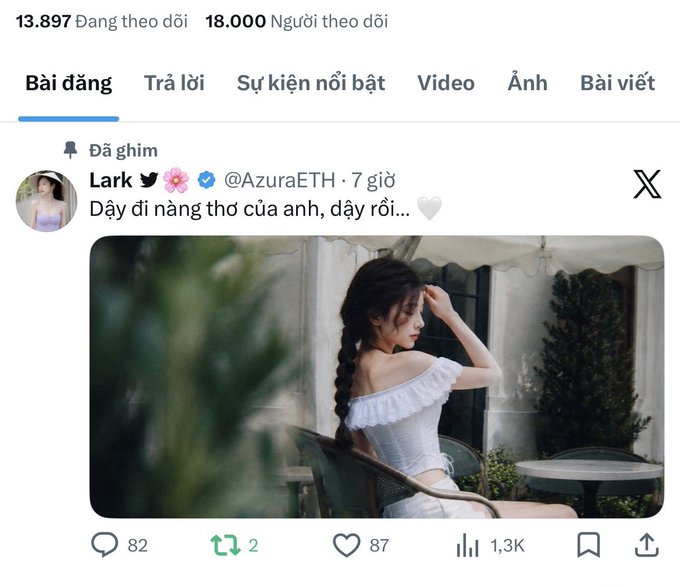 Twitter/X profile screenshot showing a pinned post by 'Lark' (@AzuraETH) featuring a photo of a woman with a braid in a white dress, with Vietnamese text and 1.3K views.