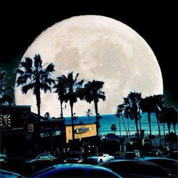 The image features a large full moon illuminating a parking lot filled with cars. The scene includes palm trees and buildings, creating an urban setting for the moonlit night. There are several cars parked along the sides of the street, as well as some people walking around in the area. The photo is taken from a high angle, providing a unique perspective on the moon's reflection off the surrounding environment.