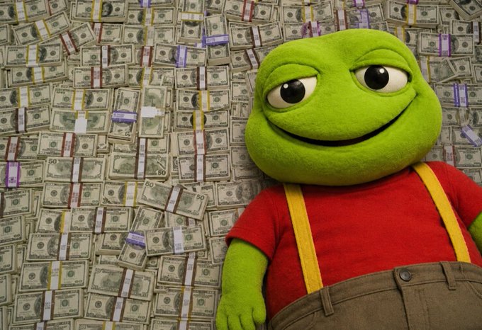 A composite image showing a Pepe the Frog plush/mascot wearing a red shirt with yellow suspenders and brown pants, posed in front of a background covered in stacks of US dollar bills.