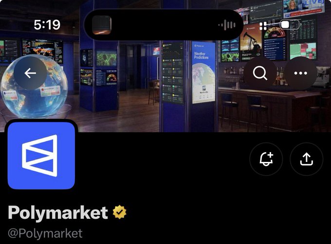 A social media profile screen for "Polymarket" (@Polymarket) is displayed with a verification badge, showing a background image of a trading floor with multiple screens displaying data.