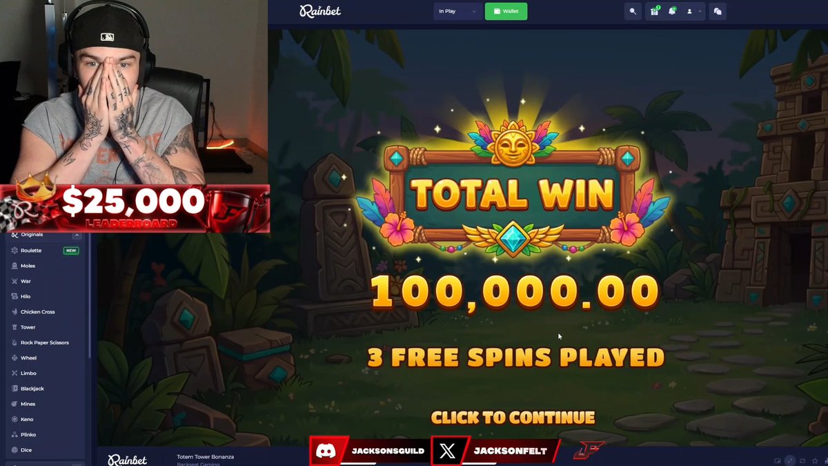 A streamer reacts with his hands over his face in shock as a "TOTAL WIN" of 100,000.00 is displayed on a Totem Tower Bonanza slot game on Rainbet, celebrating the max win after just 3 free spins played. The overlay shows his $25,000 leaderboard status alongside his social handles JACKSONSGUILD and JACKSONFELT.