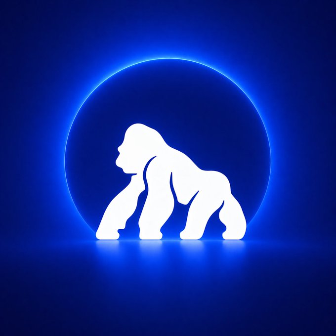 A stylized logo featuring a white silhouette of a gorilla against a glowing blue circular background on a dark blue gradient.