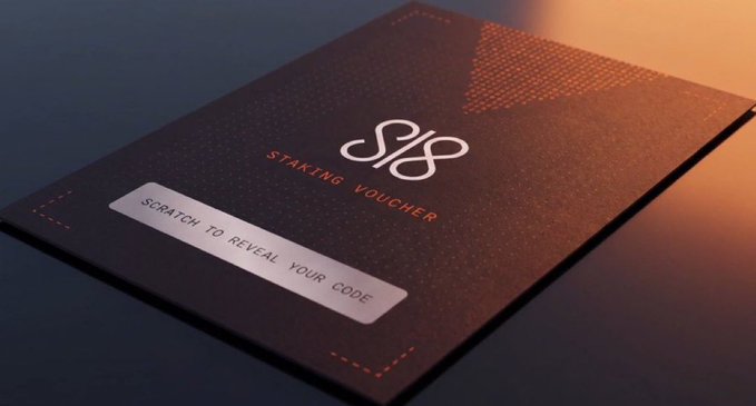 A dark, stylish 'Staking Voucher' card with an S/S monogram logo and a scratch-off panel labeled 'SCRATCH TO REVEAL YOUR CODE'.