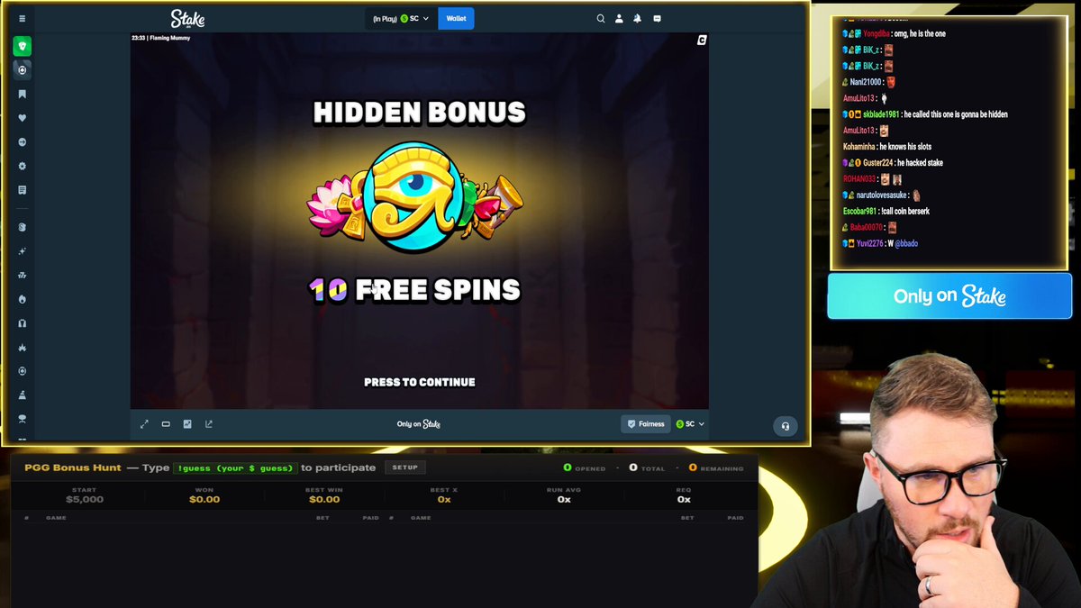 The image shows a man wearing glasses sitting at a computer screen with a gaming interface displaying a game called "Flaming Mummy" that has a hidden bonus feature, offering players 10 free spins for playing the game. The man appears to be contemplating whether or not he should play the game and take advantage of this bonus feature.