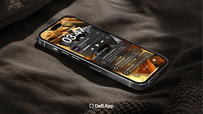 A smartphone displaying a 3:47 lock screen with a gold-toned interface, resting on a brown textured blanket, with the 'Defi App' logo at the bottom.